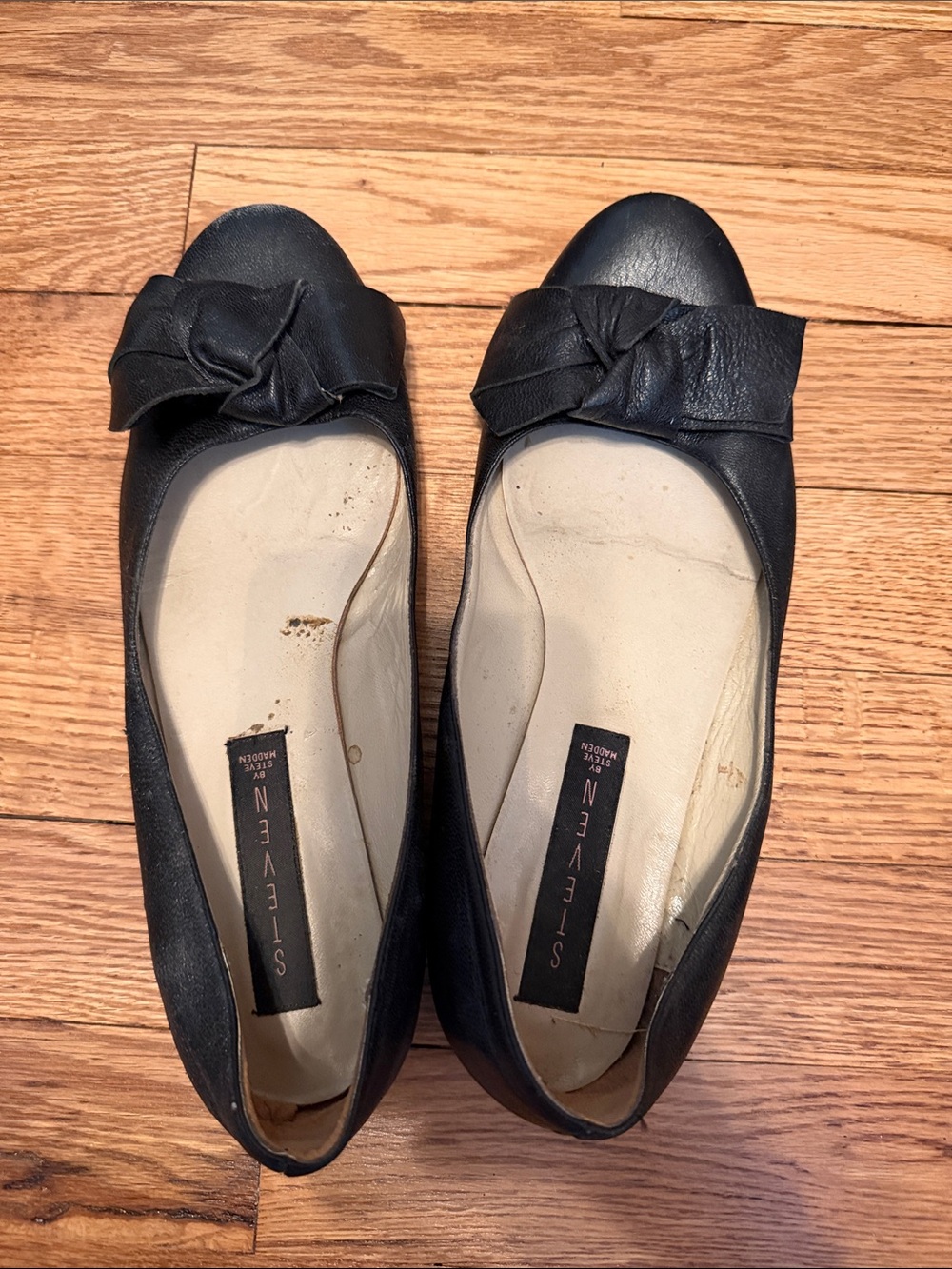 Steven by Steve Madden Black Leather Bow-Accent Women's Slip-On Flats